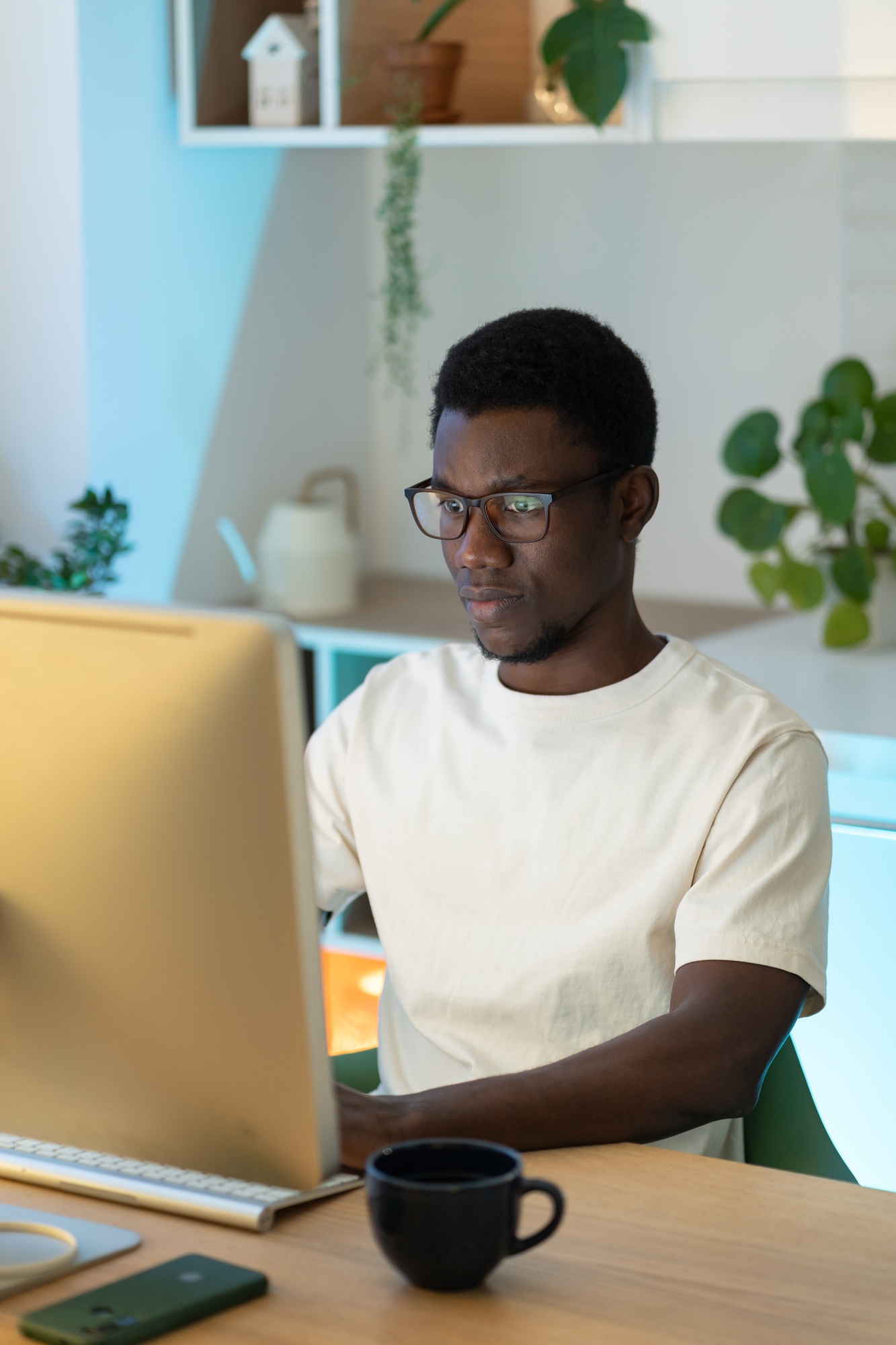 Thoughtful web developer work on computer, programmer trying to find solution for bug in app code